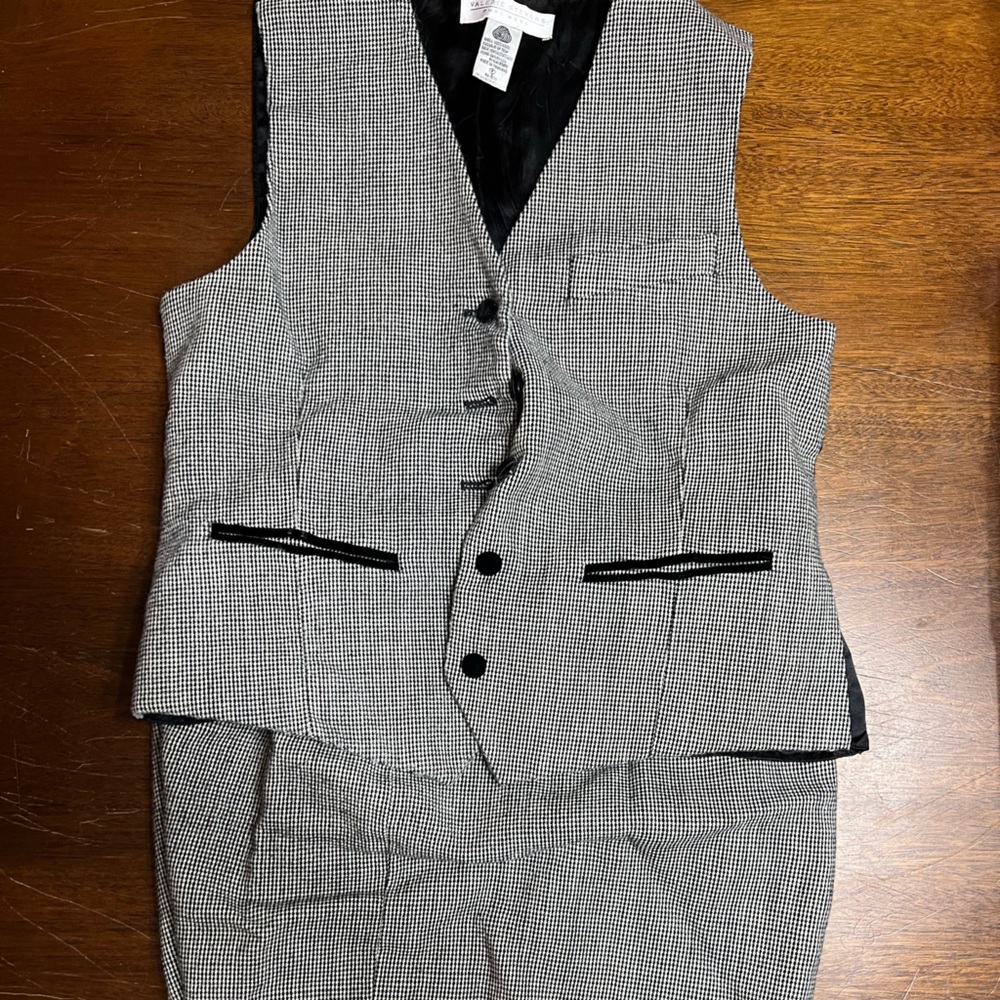 Valerie Steven’s Black and White Vest and Skirt